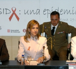 Doña Cristina, en la mesa presidencial, acompañada por el delegado del Gobierno en Cataluña y la consejera de Salud de la Generalitat de Cataluña